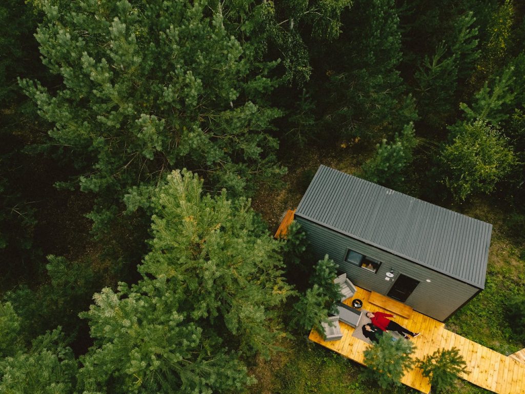 pexels-photo-9817201 Aerial View of a Cabin in a Forest