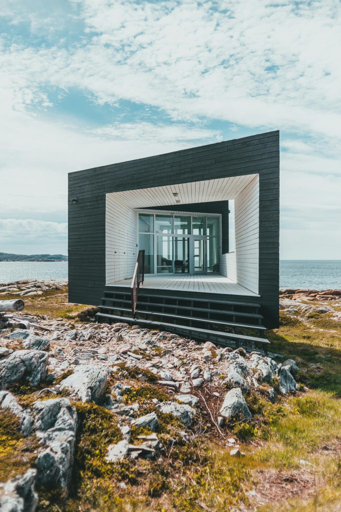 pexels-photo-8267019-8267019 Contemporary house with geometric design on a rocky seaside location.